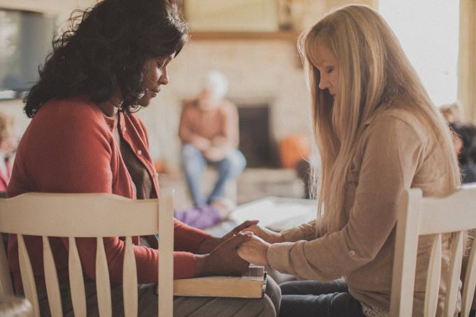 Praying women